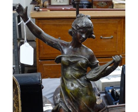 A patinated spelter figure lamp, 34cm overall 