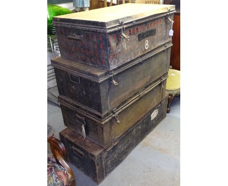4 Vintage painted black metal trunks 