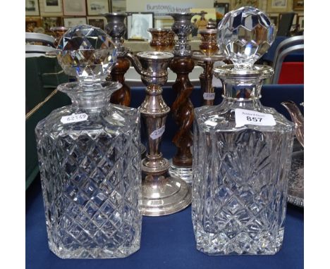 A modern square moulded glass decanter with silver stopper, and another 