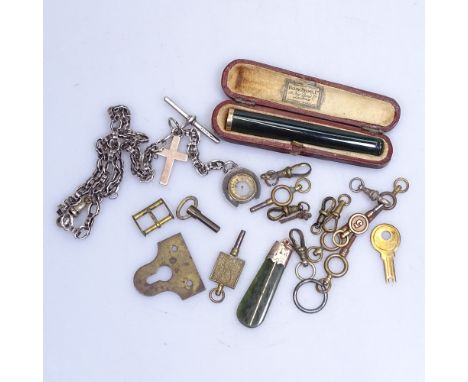 A sterling silver watch chain and compass, pocket watch keys, gold and nephrite keys 