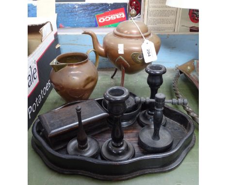 An ebony dressing table set, a copper kettle on tripod supports, and a copper jug