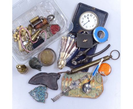 Nutcracker, brooches, a travel clock etc 