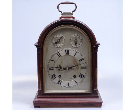A dome-top mantel clock with 2-train movement, and 3 dials, and brass carrying handle, height 34cm 