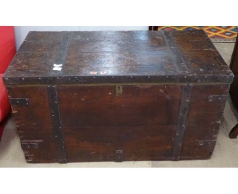 A 19th century stained pine and steel-bound trunk, W102cm, H56cm 