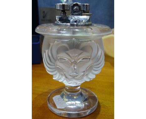 A moulded glass lion's head Vintage cigarette lighter, signed Lalique, height 11.5cm 