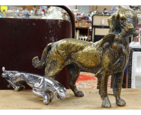 A Jaguar car mascot with serial number to base, length 19cm, and a brass hunting dog 