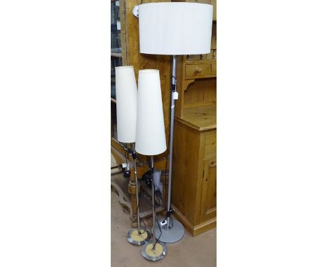 A pair of floor standing lamps, a table lamp and matching floor standing lamp (4) 