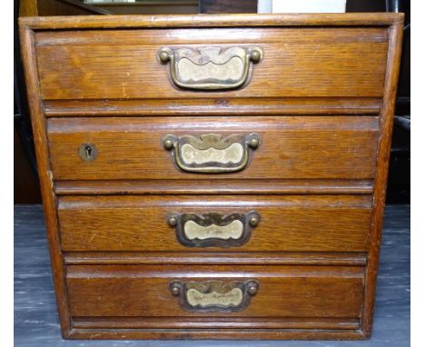 A small Vintage table-top 4-drawer collector's chest, W32cm, H31cm 