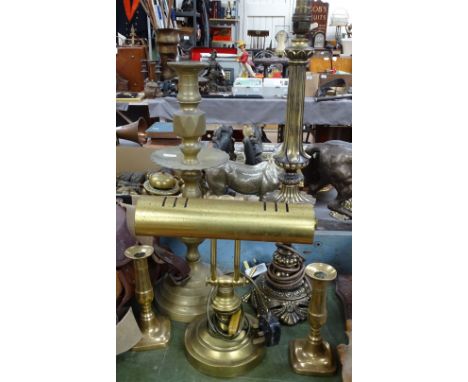 Candlesticks, a table lamp, and an adjustable brass desk lamp 