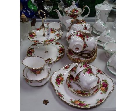 A Royal Albert Old Country Roses tea service, including teapot and cake stand 