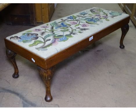 An Edwardian mahogany fender stool with needlepoint upholstery, W90cm 