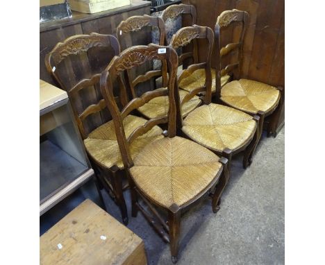 A set of 6 French oak ladder-back rush-seated dining chairs 