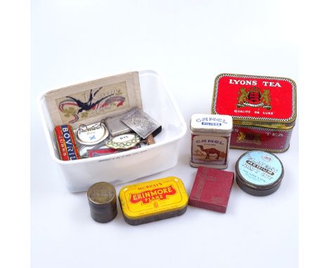 Decorative tins, badges, and decanter labels etc 