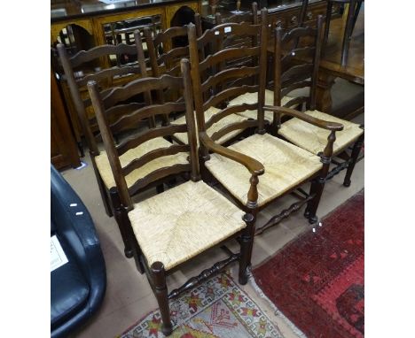 A set of 6 oak ladder-back dining chairs with rush-seats and pad foot (5 and 1) 
