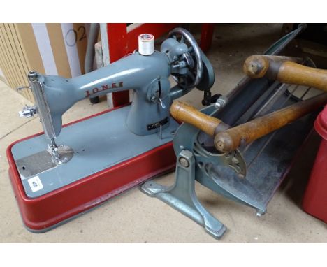 A sewing machine, an electric fire, Vintage garden shears 