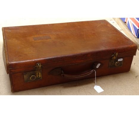 A Vintage leather suitcase with brass locks, length 59cm 