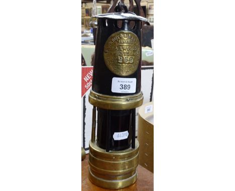 An Antique Ackroyd &amp; Best Hailwoods miner's lamp 