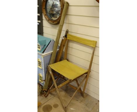 A military brass-mounted metal tripod, 76cm, with carrying case, and a folding Campaign chair with canvas seat 