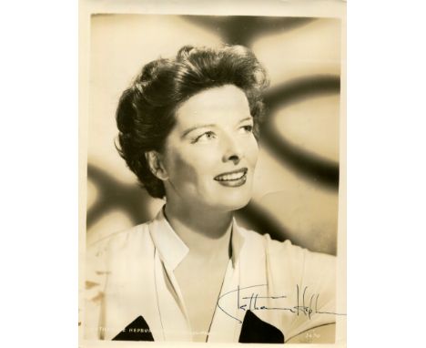 HEPBURN KATHARINE: (1907-2003) American Actress, Academy Award winner. A good vintage signed sepia 8 x 10 photograph, an orig