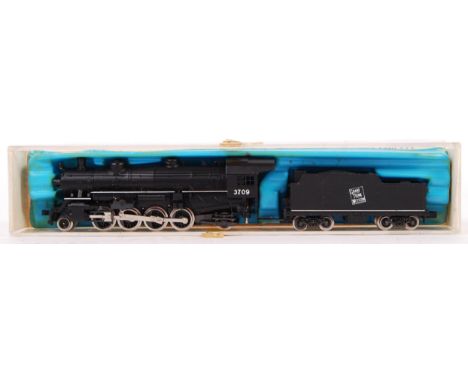 A vintage Rivarossi made N Gauge model railway trainset locomotive 2-8-2 Loco Mikado GTW. Well detailed, within it's original