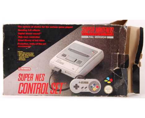 An original vintage boxed Super Nintendo Entertainment System (SNES) (PAL) video games computer console, Console number UP 16