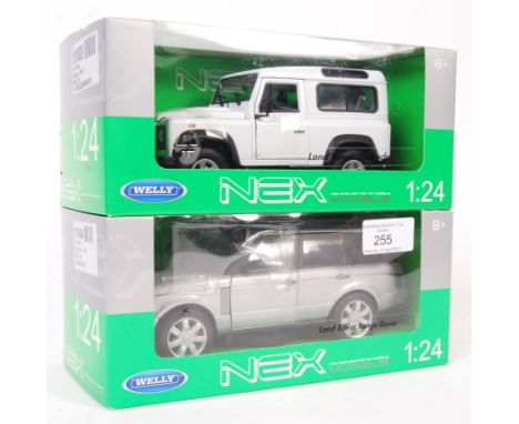 Two Welly Nex Models 1:24 scale precision diecast model vehicles to include; Land Rover Defender (White) and Land Rover Range