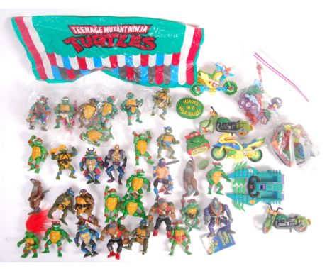 A large collection of approx x40 items of vintage Playmates made Teenage Mutant Ninja / Hero Turtles action figures. To inclu
