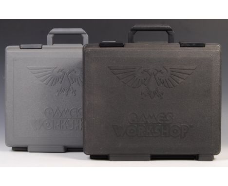 Two Games Workshop Warhammer carry cases (one black, one grey). The first case containing lots of paints and detailing elemen