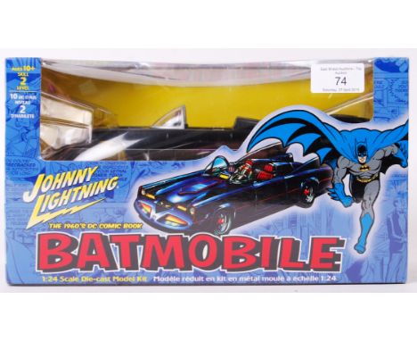 A Johnny Lightning made 1:24 scale diecast model kit ' 1960's DC Comic Book Batmobile ' from Batman. Appears mint, factory se