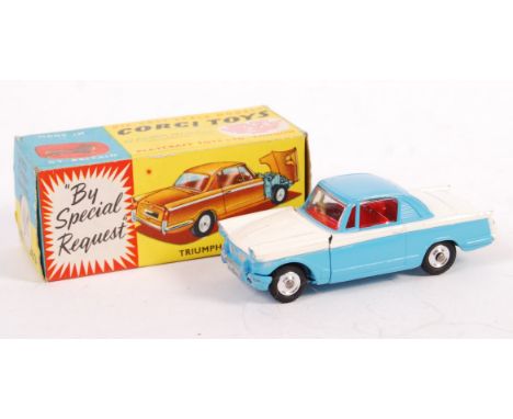 An original vintage Corgi Toys diecast model No. 231 ' Triumph Herald Coupe '. Blue and white body, with black tyres. VERY ne