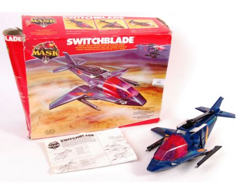 An original vintage 1980's Kenner made MASK action figure playset ' Switchblade '. Appears largely complete (sold as unchecke