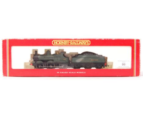 A Hornby 00 gauge railway trainset locomotive R2064 GWR Dean Goods Locomotive. Appears mint, within the original box.