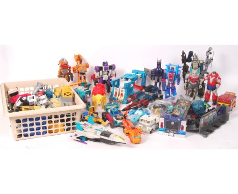 A large collection (x3 boxes) of assorted vintage 1980's Hasbro made ' Transformers ' action figures. Various generations, in