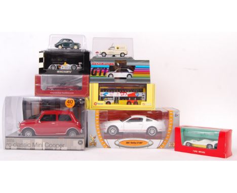A GOOD collection of 8x assorted scale diecast model vehicles to include; American excellence (NEO) 1:43 Dodge 600 Convertibl