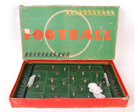 A rare vintage 1960's ' Foreign ' made ' Table Football Game '. Tinplate construction, with movable players. Contains the ori