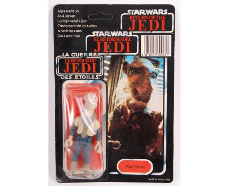 A rare original vintage Star Wars Return Of The Jedi tri-logo carded action figure ' Yak Face .' By Palitoy. Figure appears m