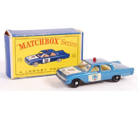 An original vintage Matchbox Lesney Series boxed diecast model No. 55 ' Police Patrol Car '. Blue, with black base and black 