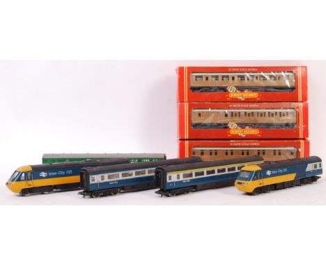 A collection of Horny 00 Gauge model railway tainset locomotives and coaches to include; Inter-City 125 Class 43 loco, dummy 