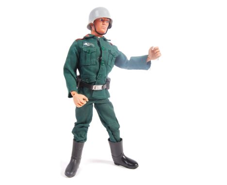 An original vintage Palitoy made Action Man figure, complete with a WWII Second World War Nazi German Stormtrooper outfit. Co