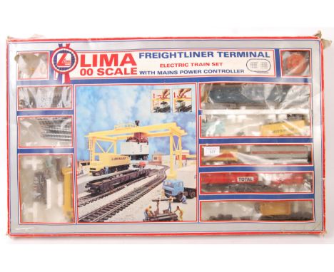 A large vintage Lima Railways 00 gauge model railway trainset ' Freightliner Terminal '. Contents appear largely correct, but