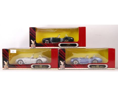 A collection of 3x Road Signature 1:18 scale precision diecast models - all Cobras - to include; all 1964 Shelby Cobras - blu