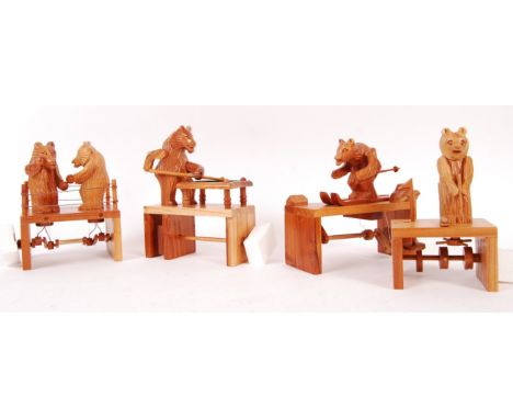 A collection of 4x assorted Chester Wedgewood's handmade wooden carved mechanical bear toys to include; Boxing Bears, Bear Pl