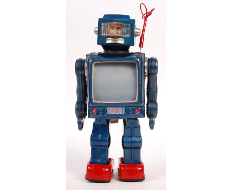 A rare vintage 1960's Made In Japan Horigawa ' TV Robot '. Tinplate construction, with printed headpiece, and litho-printed b