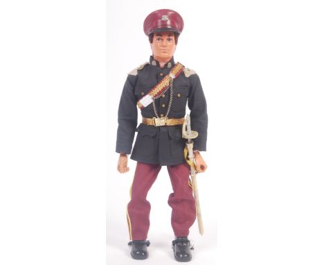 A rare vintage Palitoy made Action Man figure in Royal Hussar / Hussars outfit. Appears complete, comprising: cap, sash, swor