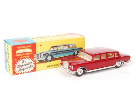 A rare vintage Corgi Toys made diecast model No. 247 ' Mercedes Benz 600 Pullman '. Red, with cream interior - with working w