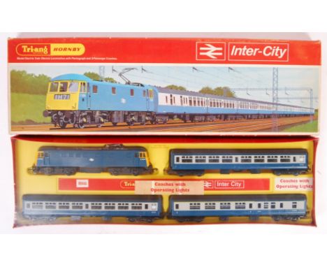 A rare vintage Tri-ang / Triang Hornby 00 gauge model railway trainset ' R644A ' Intercity '. The contents appearing factory 