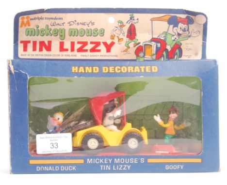 A rare vintage 1960's (1967) ' Multiple Toy Co. ' ' Walt Disney's Mickey Mouse Tin Lizzy ' action figure model set. Contents 