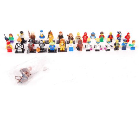 A collection of assorted 26x Lego minifigures to include; Donald Duck, Lord Of The Rings, The Incredibles, Toy Story Alien an