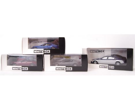 A collection of 4 x assorted WhiteBox 1:43 scale precision diecast model vehicles to include; Maserati GranTurismo MC Stradal