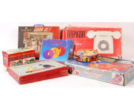 A collection of vintage boxed games to include; The Dukes Of Hazard Spiral Pinball, Vicky Cook Set, Telephone Intercommunicat